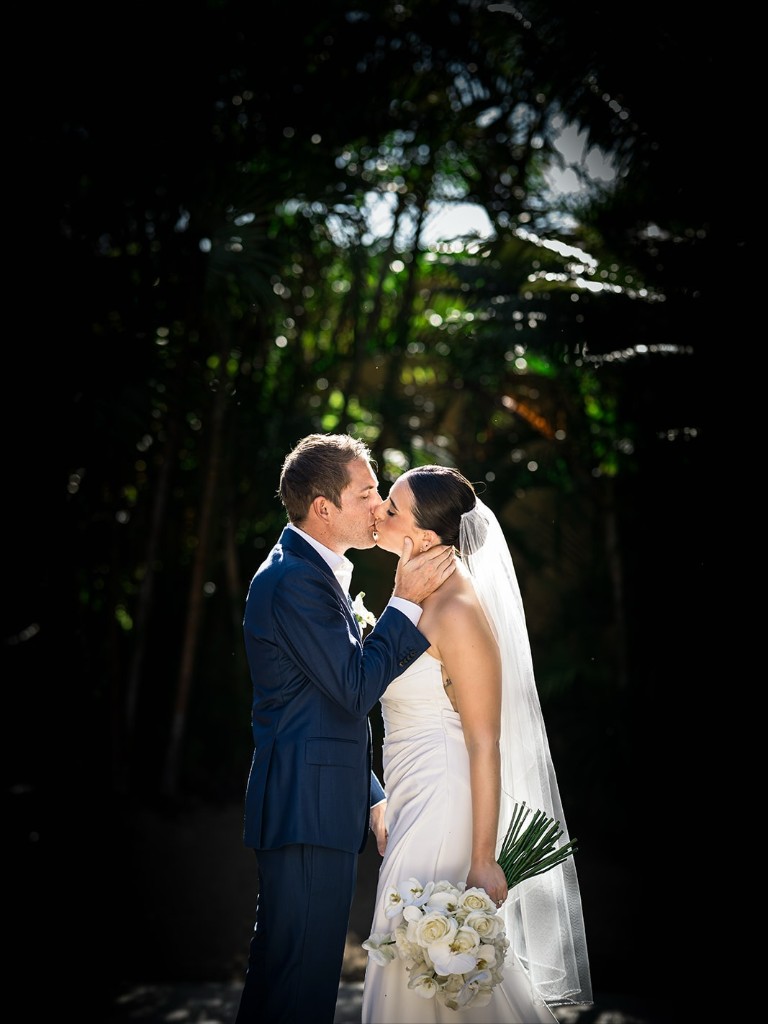 Editorial wedding kiss — Cabo destination