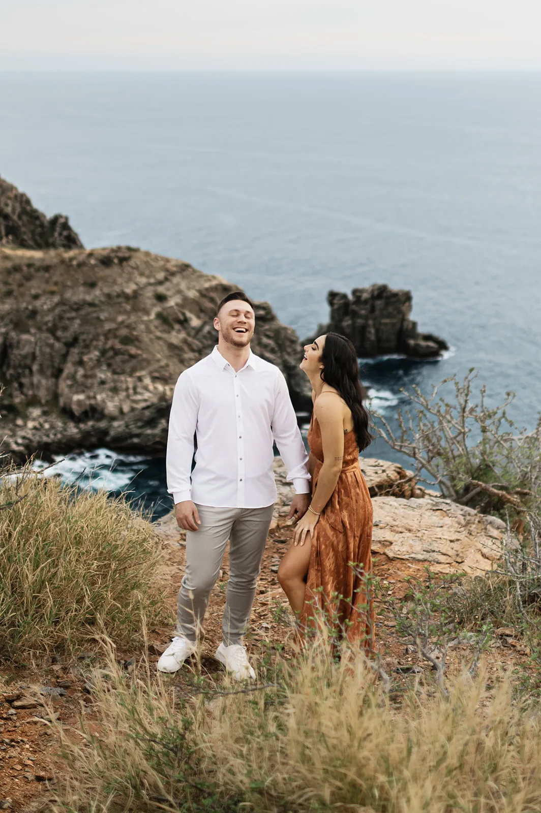 Janae and Wolf on the Pacific coast at Punta Lobos — Carlos Plazola